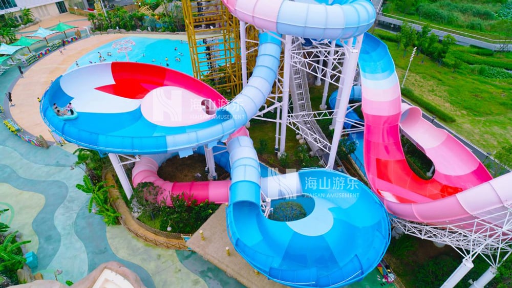 双重风暴，极致竞速——星际盘旋+巨浪翻滚组合引爆水乐园刺激体验